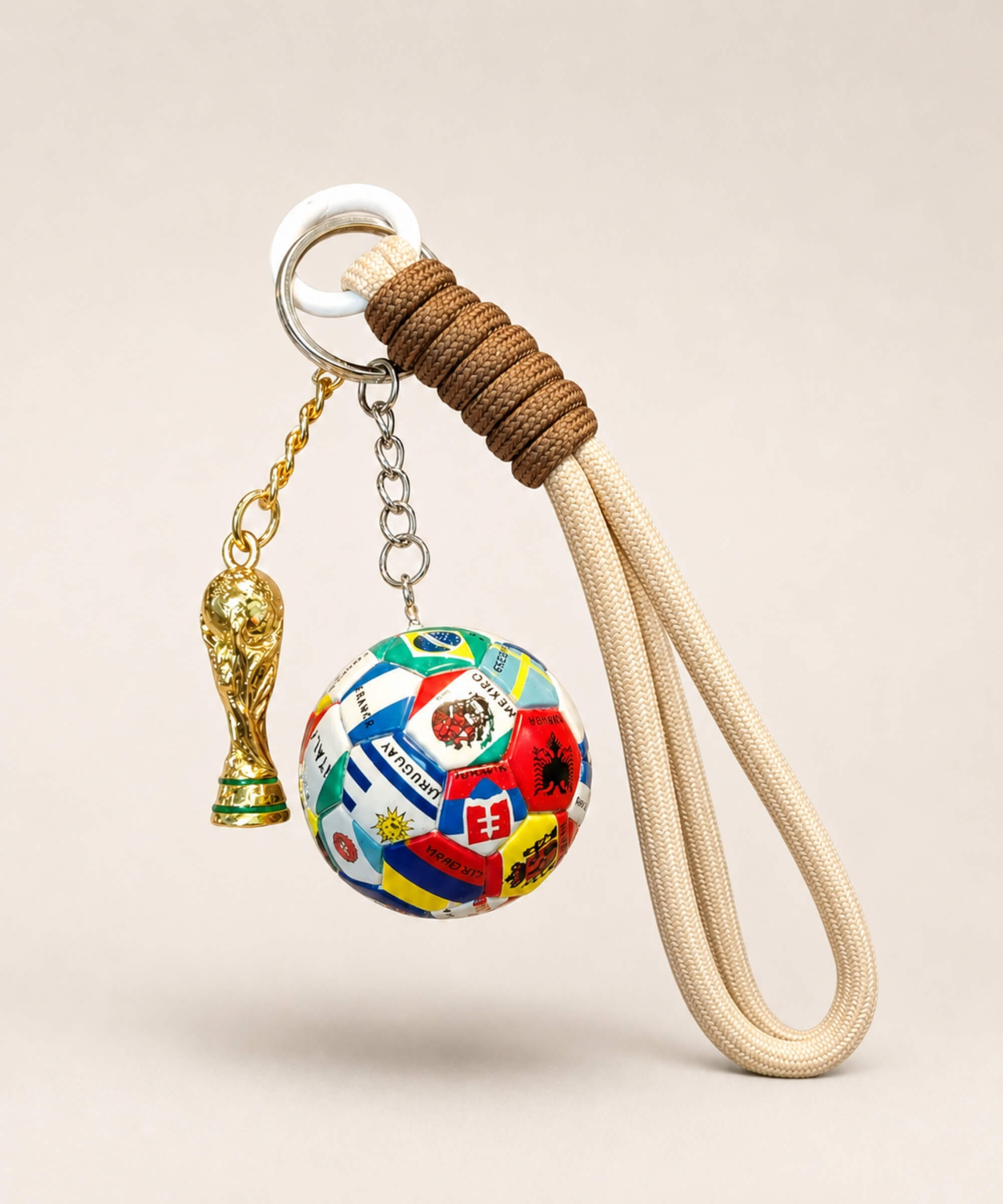 2026 World Cup inspired football keychain with multicolour football charm, trophy charm and rope strap